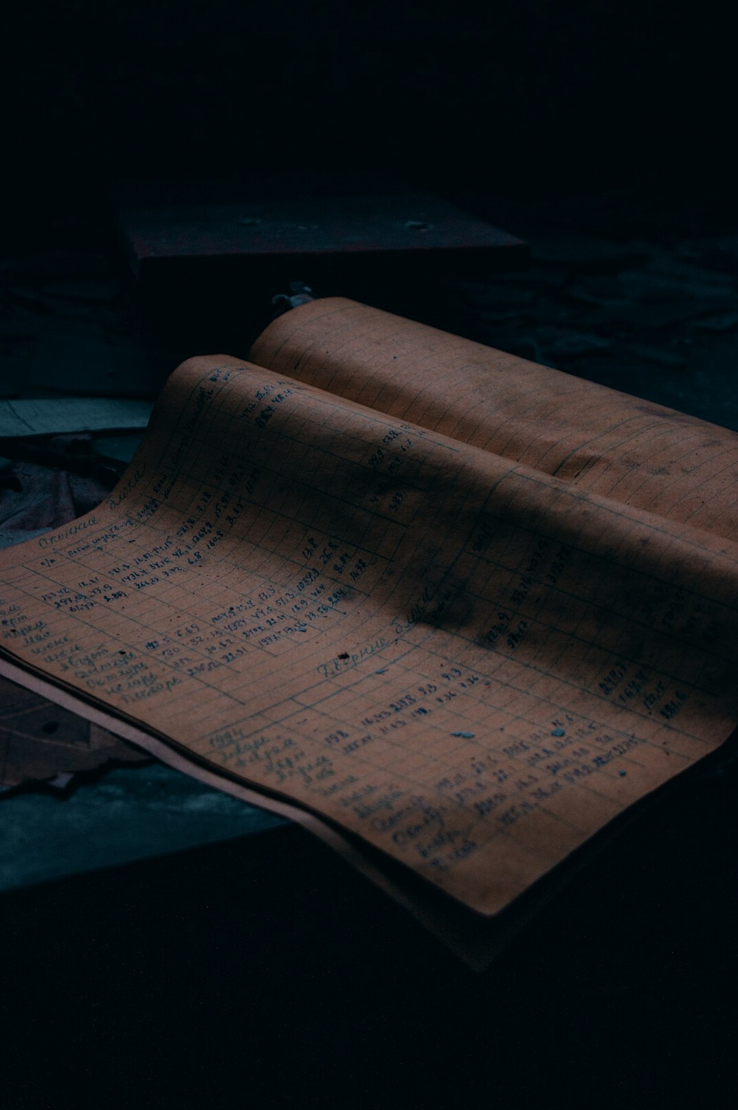 open mystery book with clues